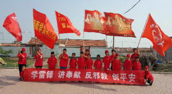 天津宁河区“小小反邪志愿者”一路环保反邪教
